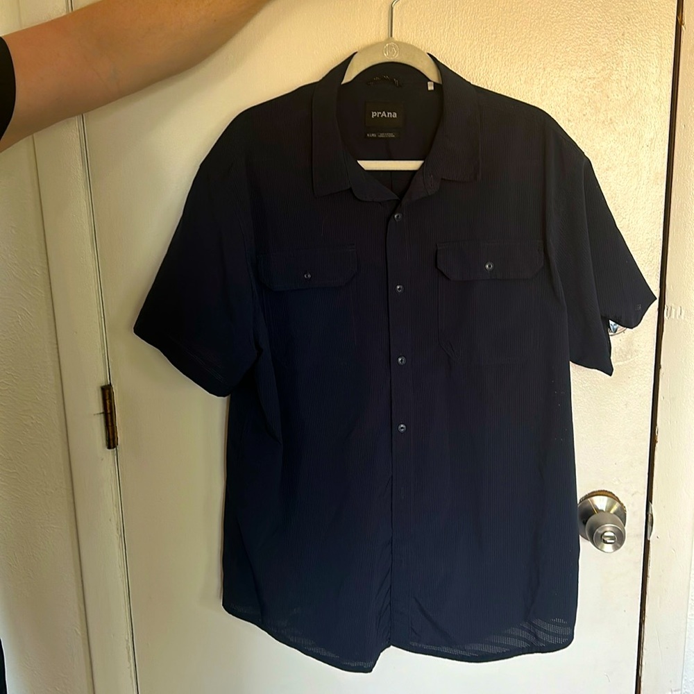 Navy blue short sleeve button up.